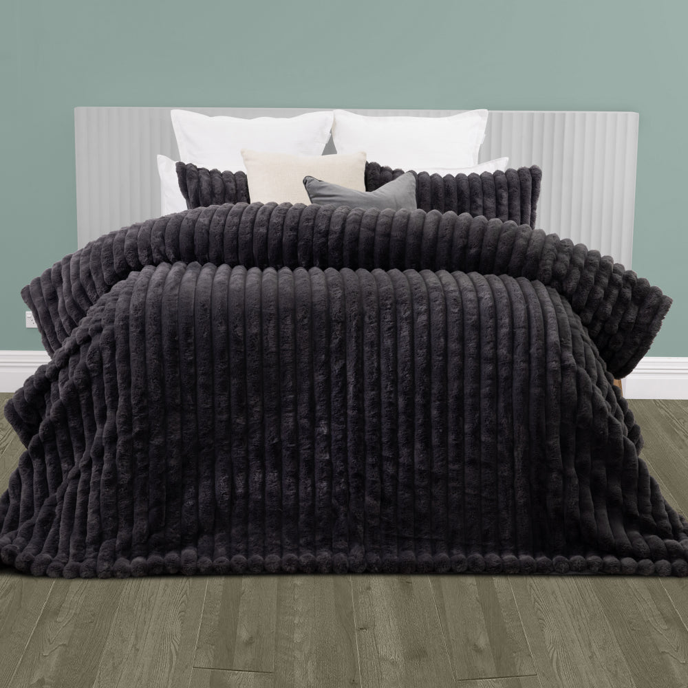 Soft Velvet Black colour comforter set, put on the bed & image is front shot. perfect for winter & chill nights