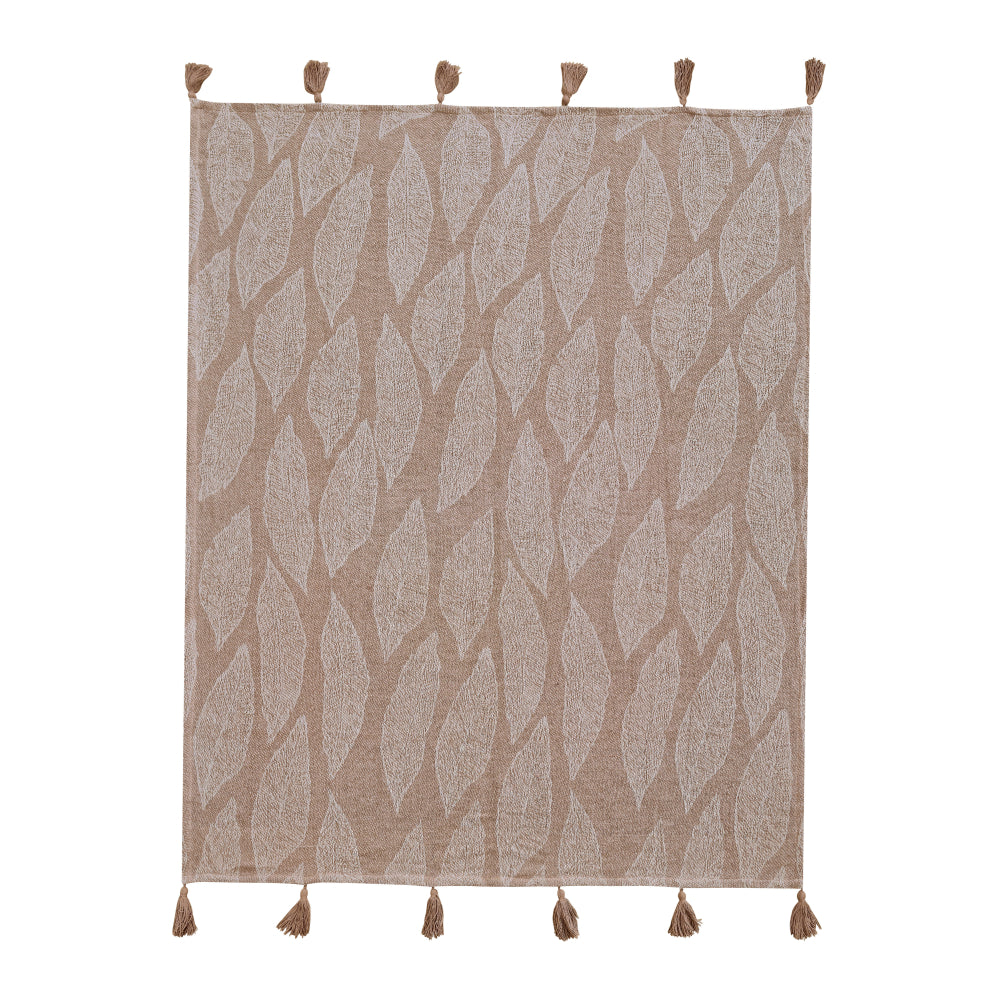 blanket throw, placed on the white tabel.