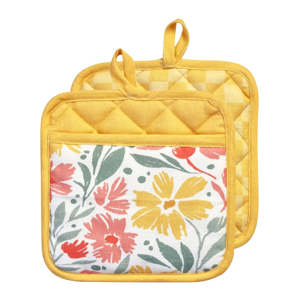 yellow colour mitts & pot holders, placed on a white table top.